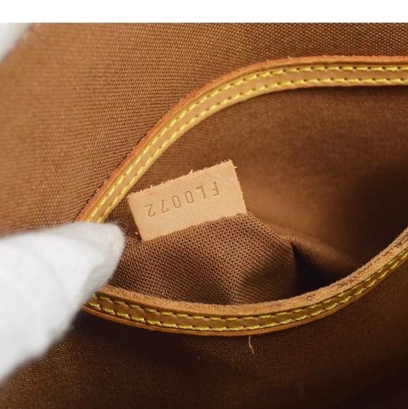 LOUIS VUITTON Alma Monogram Handbag - Picture 9 of 9